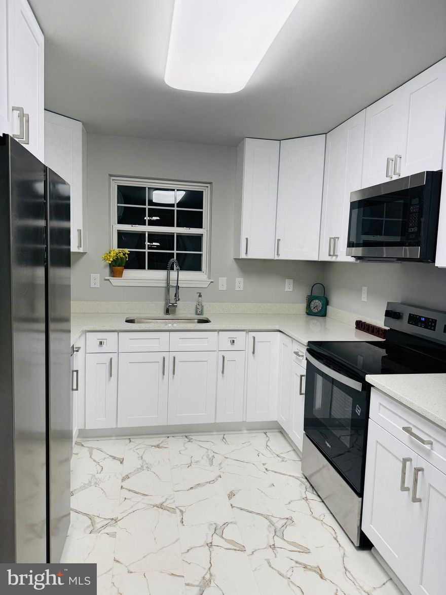 Nicely updated home in sought-after Cape St Claire. Oversized .32 acre lot.
New kitchen with quartz countertops, stainless steel appliances, and high-end soft-closing shaker style cabinets.  New bathroom in the basement with large walk-in shower and 48 inch vanity.  Main hall bathroom updated and modern.  New water conditioning system, new back deck, basement, sliding door, and some new windows.  All new light fixtures and recessed lighting added. New Service panel upgraded to 200 amp service.  All new flooring and paint.  Over $4000 in repairs recently done to wood-burning fireplace and chimney to make it fully functional.  New insulation in the attic to save on heating and cooling cost, five-year-old oil furnace and central AC, and hot water heater.
Deep lot that just keeps going and going. Lots of possibilities if you bring your imagination for  tree houses, fire pits…This home is located in a prime location. Across the street from Community preserved area with Trail three blocks from the Lake Claire Beach, boat slips, and fishing pier.
Living in the coveted Cape St. Claire community, you'll have access to two sandy beaches, a fishing pier, a boat launch, and a playground with spectacular views of the Chesapeake Bay and Magothy River. The community also offers ballfields, a swimming pool, and a shopping plaza with restaurants and all your essentials. Enjoy lively neighborhood events such as the annual Strawberry Festival in June and numerous holiday gatherings at the clubhouse.