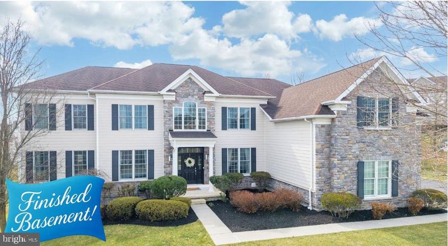 Luxury living in the scenic Brandywine Valley has never been more PERFECT! Located in the coveted “Riverside at Chadds Ford” community plus award-winning Unionville-Chadds Ford schools, 408 Trolley Way will be both your everyday oasis AND entertaining haven! Come experience the fabulous home & idyllic yards you have been dreaming of: over 7,000 sq ft of high-end enhancements and stylish finishes; 8 Bedrooms including four en-suite and a main floor In-Law Suite; 6 Full/1 Half Baths; walk-out Lower Level w/large sit-up wet bar, media center, 2 guest Bedrooms & Full Bath; oversized 3-Car Garage; PLUS custom designed Screened Porch, circular Patio, and Deck w/open air kitchen space. All adjacent to bucolic community open space & only steps away from the community clubhouse/pool/tennis courts/playground! Expertly curated through the builder’s design center and with the homeowners’ finishing touches, the home features a collection of refined luxury appointments, including: gleaming hardwood floors throughout; layered crown molding and trim; millwork & wainscoting accents; tray and volume ceilings; statement lighting fixtures; bonus sun-filled windows, transoms & skylight; upgraded Baths & fixtures; custom closet organizers; and so much more! Enter into the Reception Foyer with soaring two-story ceiling and curved staircase w/black wrought iron railings. On this main level are an elegant Living Room, spacious Dining Room, and Office with french doors and bumped-out bay window. The vaulted ceiling in the Family Room features a wall of windows flanking the mantled gas fireplace, and the open layout continues into the Breakfast Room w/tiered glass pendant lighting plus door out to the Screened Porch & composite Deck. The gourmet Eat-In Kitchen showcases the best in stainless steel appliances such as Monogram gas range/oven with upscale vent hood and instant hot water, plus double wall ovens. There is a sit-up breakfast bar island w/prep sink; large pantry closet; raised panel cabinetry & glass curios; quartz counters. Also on this main level: the Valet Laundry with new cabinets and deep sink; Mudroom niche with cubbies & cupboards; Powder Room; and access into the 3-Car Garage with new cabinet system. Do not miss the In-Law Suite with private Bedroom; Sitting Room; Full Bath; walk-in closet; and dedicated thermostat. Upstairs is the Primary Suite --- splendidly styled with chic Bedroom; Sitting Room; 3 walk-in-closets; and Full Bath with soaking tub, stall shower, two individual vanity sink areas plus extra vanity/dressing station. Down the hall are 4 more Bedrooms all with ample closets: 2 are en-suite with their own Full Baths, and 2 have a dual-access Full Bath. WOW! These owners thoughtfully designed and customized the Walk-Out Lower Level (with radiant floor heating) to create exceptional spaces for entertaining and recreation. Featuring a Media/Sound Center accented by a linear wall fireplace; large 10x10 Wet Bar w/sit-up counter seating; french doors into a Bonus Room for hobbies/fitness/work room; Full Bath; and 2 additional Bedrooms w/egress windows & closets that could be guest spaces or whatever you imagine! The outdoor living areas have been recently enhanced  with a large 300 sq ft Screened Porch w/heating and media alcove; large composite Deck; steps down to the yards & the circular paver Patio. The fenced (perfect for pets!) yards back to trees and the property is next to beautiful open space. Riverside at Chadds Ford has a community clubhouse and fitness center; swimming pool; tennis courts; playground; more! So conveniently located to Rtes 1/52/202, plus West Chester; Kennett Square; Wilmington; Philly/airport; shore points & everywhere you want to be! Home is in outstanding condition but as a BONUS includes an AHS ShieldComplete Home Warranty ---  their highest level of coverage & peace-of-mind for you! Some photos virtually staged. Verification (including sq ft/size/lay-out/more) lies with the consumer.