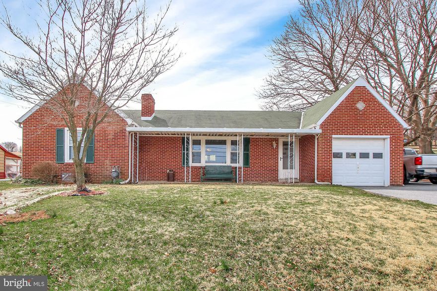 All brick rancher with all new windows, plus updated flooring and paint.  LR has fireplace with pellet insert and kitchen has ceramic counter tops.  Lower level could be finished or used as workshop as current owner.  Sit on the private back deck and enjoy the private backyard.  Great location, only 2 miles from I-83.