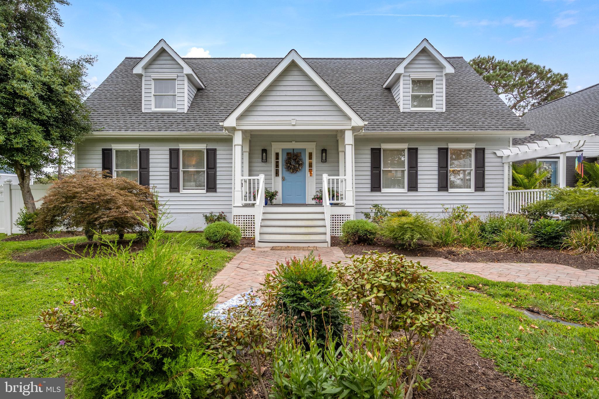 Wake up to stunning open water views of Sinepuxent Bay and Assateague Island from this beautifully updated 4BR/3.5BA Cape Cod, perfectly situated on nearly ¾ of an acre in the peaceful Genezer Estates community. Inside, you’ll find a bright and spacious layout featuring two bedrooms on the main level and two upstairs—ideal for multigenerational living, guests, or flexible home office space. Tons of windows, flood the home with natural light while framing the incredible views. With over 3,000 sq ft of finished space, a two-car garage, and a large, cleared yard, this home offers comfort, versatility, and unforgettable sunsets—all just minutes from Ocean City beaches, marinas, and golf.