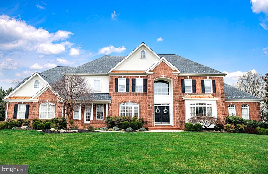 This impeccably designed home in Willow Chase, with its beautiful architecture and impressive design is sure to impress your most discerning buyer.  Boasting over 7900 square feet, this stunning home has been updated with top notch finishes and  features 5 bedrooms, 4 full bathrooms and 2 half baths.  A grand foyer, gleaming hardwood floors and a beautiful staircase sets the tone for elegance as you enter this home through double doors.  A beautiful conservatory surrounded by windows is a wonderful addition to this home and serves as the perfect study. A sun drenched family room with soaring ceilings awaits quality time with family and friends while gathering around a beautiful fireplace. The custom designed kitchen is a chef’s dream and features a breakfast bar and an exceptional butler’s pantry with its own dishwasher. Indulge in culinary delights with a Wolfe cooktop,  Subzero refrigerator, double Wolfe ovens,  two Bosch dishwashers and two Rohl sinks, both with InSinkErators. Granite countertops add to the beauty of this kitchen. The mudroom has its own entrance and includes a beautiful built in, adding an attractive and useful space. Ascend to the upper level by a convenient back staircase to 4 very spacious bedrooms and 3 full baths. The primary bedroom is the perfect sanctuary, where you will find a cozy sitting room adorned with a gas fireplace. A new luxurious bath offers opulence with marble countertops, state of the art shower, free standing tub, custom cabinetry and a heated floor. The lower level of this home offers another retreat of its own. Featuring a magnificent custom bar, this just might become your favorite place to entertain friends and colleagues. A game area, comfortable sitting area, a fifth bedroom with full bath, workshop and storage area complete this level. Outdoor living is inviting with a beautiful deck and a very spacious fenced in backyard.  Updates include new roof, new HVAC'S, newer custom kitchen, new owner's suite bath and refinished floors. This incredible home even comes with a whole house generator for peace of mind.  WELCOME HOME!