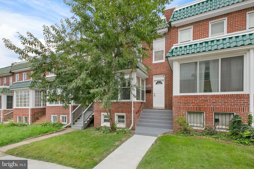 Quintessential 1924 Rowhome in Waverly with a coveted sunroom. Super convenient to Hopkins Homewood Campus, Waverly Farmers Market, YMCA, Giant, and Library. Many recent updates include a new rubber roof and steam boiler in 2021, new copper piping in the basement, and more! The main level has a living room, sunroom, large kitchen with dining area, half bath, and laundry. The second floor has three bedrooms with wood floors and a full bathroom. The lower level is very spacious and has lots of space for additional living space, studio space, or storage. The rear of the property is fenced with space to park one car.