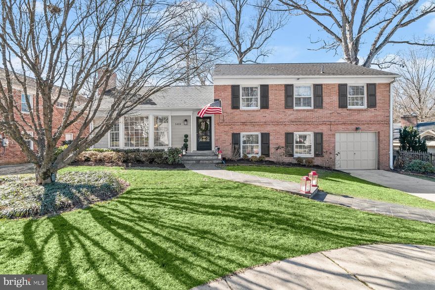 It is not an overstatement to say this home is in fantastic, updated, decorated condition, requiring nothing to be done before your move! The kitchen and dining room were expanded a few years ago and the result is a spacious, designer kitchen with a quartz island,  ample white cabinetry and upgraded stainless steel appliances. The pictures don't lie! All three baths are stylishly updated and there is a powder room on the family room level. Unique to this model, the short stairway to the family room is about 8' wide so that level feels like part of the main level. Open and awesome! There is a cozy room on the lowest level that can be a fifth bedroom and it has an en-suite bath. There is a lovely rear patio and yard for outdoor dining and fun. This home is a knockout and shows every bit of the $300K in improvements that the seller have invested! AND, it is a very short walk to the soon-to-be fabulous Westbard Square shopping and dining area as well as Whole Foods. The Capital Crescent Trail is about a half mile away for a quick bike ride into thriving downtown Bethesda. Walt Whitman High School. You will want to check this one out right away!