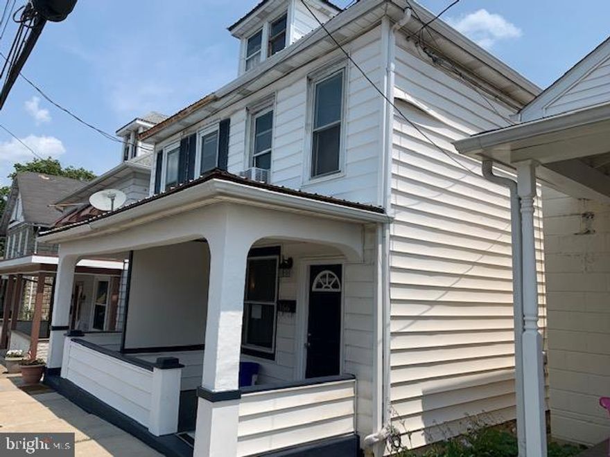 Own an investment property with tenant in place. Updated half double house includes new kitchen appliances, backsplash and counters, recessed lighting, laminate floors, and new drywall throughout. Relax on the covered front porch or hang out in the screened rear porch. Off street parking and easy entry to basement from the yard. Tenant has lease until 5/2022.