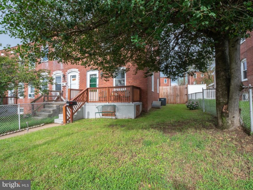 EVERYTHING'S BEEN DONE HERE!!! Lovely end unit w/large fenced yard features upgrades galore including a beautiful kitchen w/maple cabinets/new appliances, nice bath w/new tub&tile, replacement vinyl windows, energy efficient Goodman gas furnace w/central air, gas hot water heater, hardwood floors, a great front porch + extra side yard space!!! Lower level could be office, family room or 3rd BR.