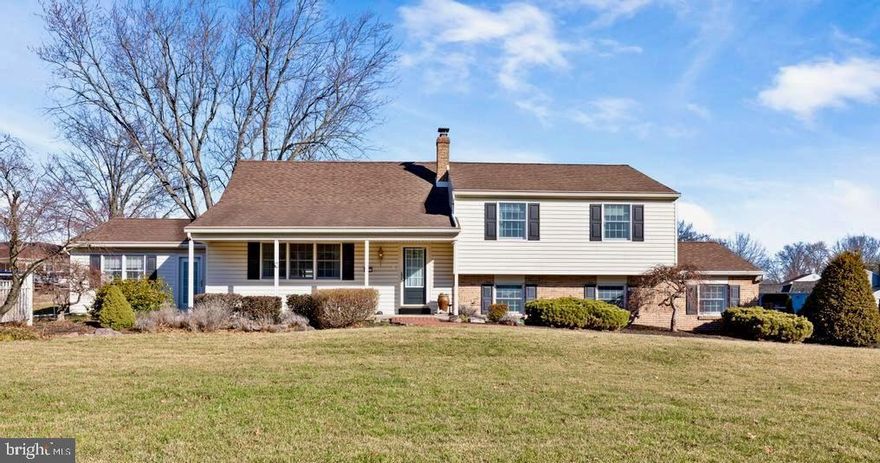 If you are looking for a beautiful home in a vibrant community, you have found your nest. This exquisite home with attached multi-functioning in-law suite offers a perfect blend of traditional elegance and modern convenience. A handsome facade including brick entrance pathway and covered front porch graciously welcome you home. Set on a generous corner 3/4 acre lot on a charming street ending in a delightful cul-de-sac, this property boasts an impressive array of interior and exterior features catering to both comfort and style. Step inside to discover a spacious layout. The large sun-lit living room opens to the heart of the home, the main-level eat-in kitchen and dining area, complete with upgraded countertops, modern appliances, an island for easy preparation and ample space for gatherings with family and friends. The spacious kitchen also includes a warm eat-in dining area, creating a harmonious space for entertaining.   A sliding door from the kitchen leads you to the delight three-season sunroom where you love to spend seasonal days with views of the serene backyard. Steps from the other side of the kitchen lead to the lower level including a large family room with brick hearth and wood-burning fireplace, ideal for winter evenings. A side entrance from the driveway leads to a convenient lower-level hallway including a large remodeled powder room accompanied by a wet bar/cabinets for additional household storage and also entrance to the attached two-car garage with functional epoxy floor. Return to the stairs to the upper bedroom levels. The primary bedroom suite offers a private retreat with a handsome ensuite bathroom featuring a stall shower. Three additional bedrooms, accompanied by a modern hall bath with shower/tub, provide ample space as bedrooms or alternate use as a home office if you choose. The definitely cozy in-law suite with living room, one bedroom, one full bath, galley kitchen and own private outside entrance will charm you. There is an interior door from the cozy house to the main house making easy connections from cozy to main house. The in-law suite could also potentially be used as an au-pair suite, for college graduates or adult family members or guests, or an office or business, depending upon local laws and requirements. The unfinished basement presents an opportunity for customization, whether you envision a recreation room, workshop, or additional storage. Outside, the property is a true oasis, featuring extensive brick hardscaping enhancing the outdoor living experience.  A charming shed provides additional storage for gardening tools or outdoor equipment. The location is a standout feature, with easy access to local parks, schools, and community amenities. Residents enjoy the benefits of a friendly neighborhood atmosphere, where outdoor activities and community events are just a stone's throw away including township and school play areas across the street and a community pool within a mile or so walk. With an attached garage accommodating two vehicles and additional driveway space, parking is never a concern. This home is not just a residence; it's a lifestyle choice in a vibrant community that values connection and convenience. Experience the perfect blend of luxury and comfort in this remarkable property, where every detail has been thoughtfully considered for modern living. Popular Laurel Lane Park is just beyond Laurel Circle, street on way to Spruce Lane cul-de-sac. Easy and convenient proximity to shopping, restaurants, and events in Harleysville and Skippack. This home is also extremely close to the Kulpsville entrance/exit to the Northeast Extension of the PA Turnpike making commute and/or travel a much closer ride. This is a home you will love to call "Home".