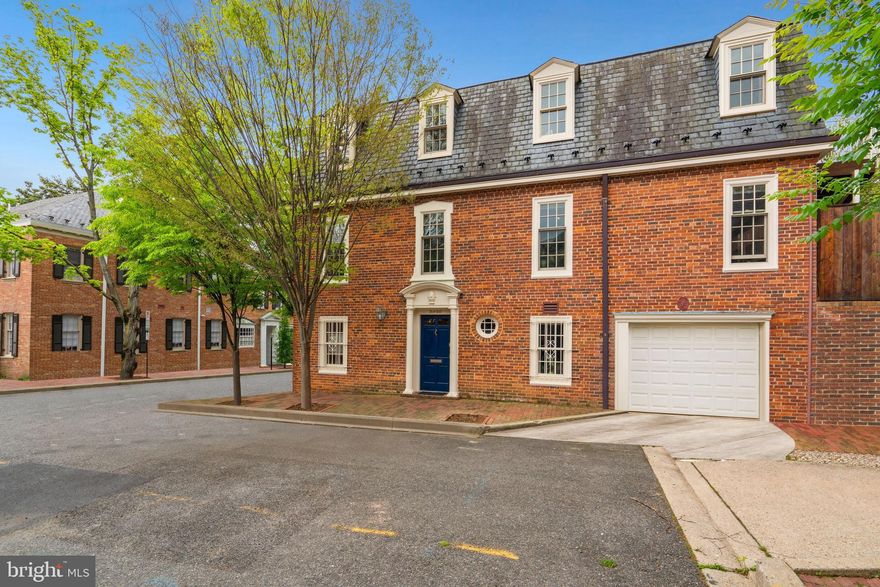 Stunning Federal end-of-row townhouse situated in private cul-de-sac in the heart of Georgetown with attached Garage, large rear patio and roof deck! 4BR/3.5BA features high-end finishes, tall ceilings, hardwood floors, and spacious, light-filled living throughout.  Main Level features Living Room with fireplace, enjoys access to Patio through French doors, fully updated gourmet Kitchen complete with top-of-the-line stainless steel appliances, Dining Area with updated fixtures, and Powder Room. Upper Level includes spacious Owner Suite with 2 closets and custom built-ins, enjoys its own Deck overlooking Patio, accessible through 2 sets of French doors, en-suite Full Bath with dual vanity and steam shower. Ground Level features private Study/Bedroom with bay windows, storage Closet, and en-suite Full Bath with steam shower, Bedroom #3 with walk-in Closet, and Laundry Area. Complete with stunning brick Patio featuring several seating areas, w/ serene water features, beautiful landscaping, and mature plantings for privacy. 1-car Garage w/ ample storage space and access to Lower Level.