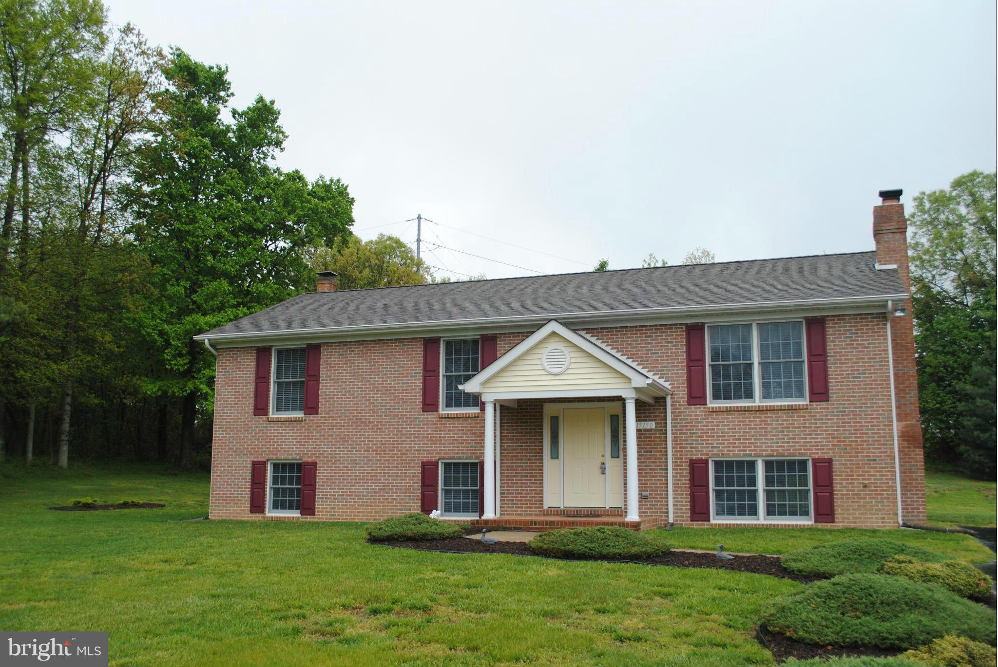 TOTALLY REBUILT IN 2003 - ALL BRICK BEAUTY-ANDERSON WINDOWS-HARDWOOD FLOORING - THIS IS A MUST SEE HOME!!! LOTS OF NATURAL LIGHTING - END OF STREET LOCATION FOR ADDED PRIVACY -GREAT FOR COMMUTERS-NO HOA-ENORMOUS EAT-IN KITCHEN W/FORMAL DINING AND SERVING BAR-EXTRA FREEZER,BAR STOOLS TO CONVEY,WELL MAINTAINED,WARM OIL HEAT,WOODSTOVE,1 YEAR WARRANTY,READY TO GO!! EXCELLENT FIND!! BLINDS TO CONVEY