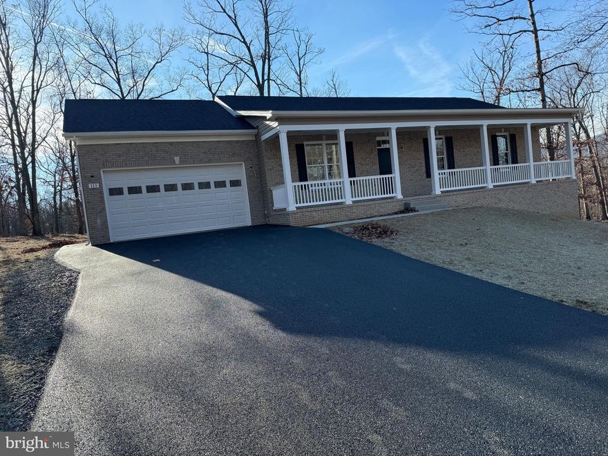 Welcome to this stunning new construction ranch style home offering the perfect blend of comfort and style. Featuring 3 spacious bedrooms and 2 full baths, this home showcases an inviting brick front with a full front porch which is perfect for relaxing evenings or morning coffee. Step inside to find hardwood flooring throughout and an open floor plan that flows effortlessly from the living area to the kitchen and dining spaces. Elegant crown molding adds a touch of sophistication while large windows bring in plenty of natural light. The modern kitchen provides ample counter space and overlooks the main living area, making it ideal for entertaining. A two car garage offers convenience and extra space. This thoughtfully designed home combines timeless craftmanship with today's sought-after features that's ready for you to move in and make it your own!