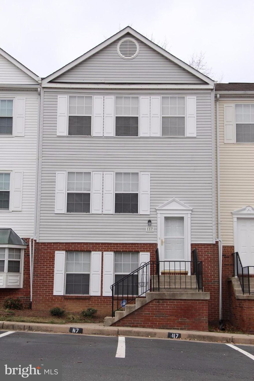 Townhome! Freshly painted throughout the house, freshly stained deck, medium size back year, new smoke alarms.  Immaculate,  and less than 5 miles from I-95, and close to Quantico, shopping, hospital, restaurants. Features 3 large bedrooms w/ 2 full baths and 1 half bath. Formal living & dining room. Finished bsmt with large family  room with rear entrance. Two parking spaces. Hardwood flooring in living and dining room. Washer & dryer stay for tenant use.  Sorry NO PETS!  Background check link:  https://apply.link/3afp9k1