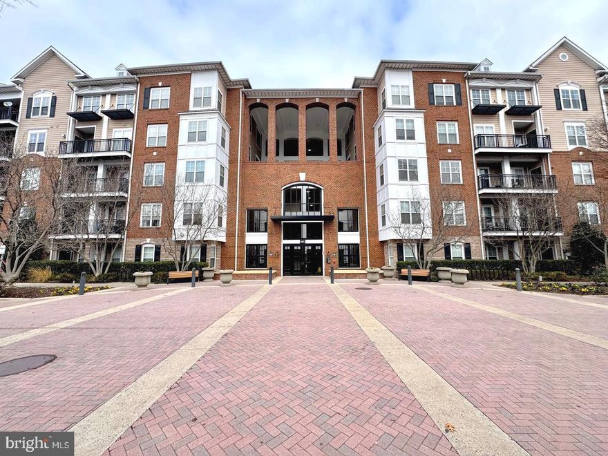 FITZ at ROCKVILLE TOWN CENTER! Located on the 2nd Floor. Excellent Conditions. Master Suite Bedroom with a walk-in Closet. Wood Floors, Laundry Room off Kitchen w/full size Washer and Dryer, and additional storage. Brand-New Dishwasher. The Balcony overlooks the Swimming Pool. The Fitz amenities include an outdoor pool, Gym, Theater Room, Cyber Cafe, Party Room w/Pool Table, Ping Pong, and a kitchenette. Fios TV, Internet, and Water are included in the Condo Fee. Security Gate to Garage. 2 assigned  Garage Parking Spaces ( #47, #365 ). Parking Spaces for the Bikes. Convenient Walking distance to Rockville Town Center, METRO, Movie Theatre, Restaurants, Library, and Weekend Farmer's Market. Easy commute to Bethesda, DC, minutes to I270.   **** THIS IS A MUST-SEE! ****