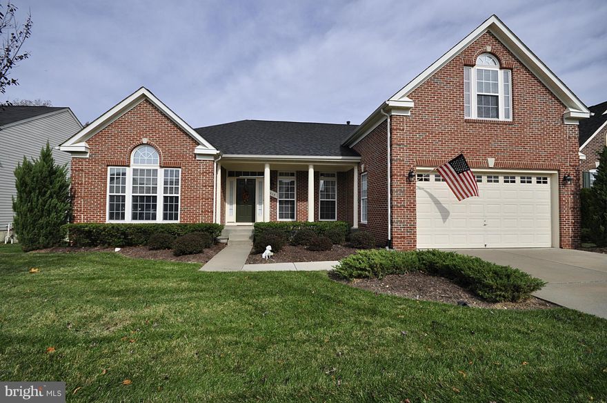 REDUCED BELOW APPRAISED VALUE! MAGNIFICENT HOME PROVIDES PANORAMIC WOODED VIEWS FROM SPACIOUS GREAT ROOM, PORCH & SUN ROOM.  QUALITY EXTRAS OTHERS DON'T HAVE:GLASS TILE,GRANITE,GOURMET KITCHEN,ELEGANT DINING AREA & ABUNDANT WOOD FLOORS. MASTERFULLY DESIGNED, EXPANSIVE MAIN LEVEL OFFERS SUMPTUOUS OWNERS SUITE,2 BR GUEST/IN LAW OPPORTUNITY & COMFORTABLE LIVING AREAS. PLUS LOFT & FINISHED BASEMENT.