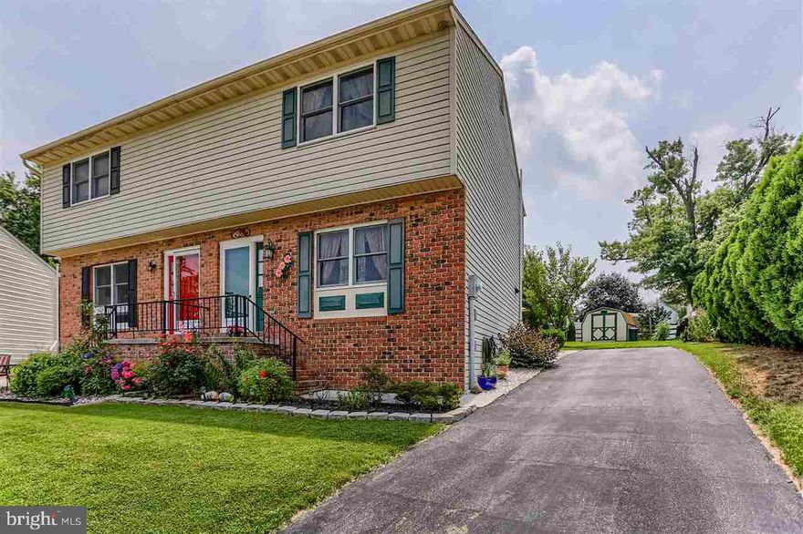 This house is in wonderful condition!  Laminate floors, white kitchen cabinets with appliances included, nicely finished family room in the lower level and more!  Updated patio door and closet doors.  Natural gas heat and Central air. One year home warranty included.  Great outdoor space with deck and paver patio.  Shed.  Great location in a small South Hanover development.  Convenient for MD commuters.