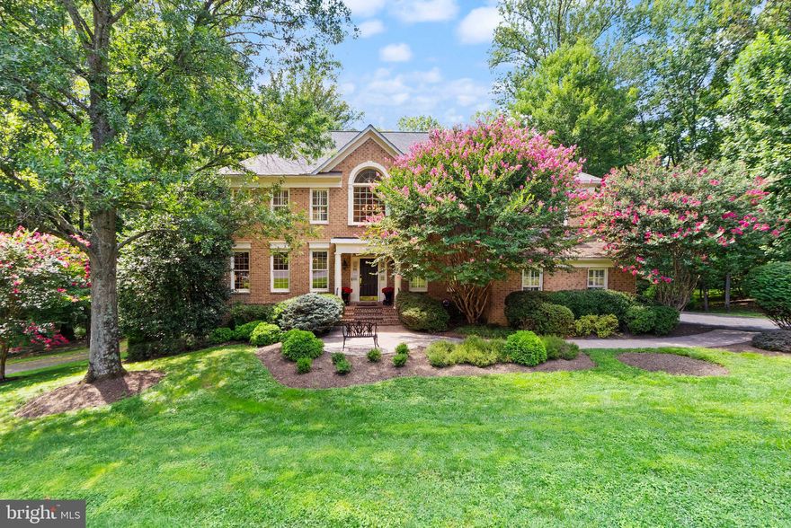 Welcome to this beautiful East Facing luxury-built estate home, by Renaissance (Grand Renoir Model), situated on almost an acre. You could be  moved in and ready to host family and friends for the Holiday's!!! Location is everything (where Reston/Great Falls & Herndon Meet on the Rt 7 Corridor) near major commuter routes and public transportation. This location is amazing while being a private oasis at the end of a quiet cul-de-sac surrounded by mature trees. Upon entering the home,
you will be greeted by a grand two-story foyer & an eye-catching, curved staircase. The main level
features an open floor plan with a main level office, living room, formal/separate dining room with
Butler’s pantry. Off the dining room is the beautifully appointed, gourmet eat-in kitchen with cabinets
galore, and granite counters, center island with breakfast area. Just off the kitchen is the Great Room
with a 2-story soaring ceiling, floor-to-ceiling stone fireplace, gorgeous, oversized Palladian windows
that bring in natural sunlight with a view of the lush backyard. From the Great Room, a 2nd staircase
leads to the upstairs. The upper level features a beautiful, curved hallway leading to 4 spacious
bedrooms. The primary suite has a vaulted ceiling which breathes openness, and beautiful windows
bring in soothing natural light. The newly remodeled en-suite luxury bath has a large free-standing
soaking tub, his/her separate vanities, a glass enclosed shower, 2 walk-in closets and a beautiful
Palladian window centered over the soaking tub. The bedroom to the rear of the house has 2 large closets (the walk-in is roughed-in for a full bath - which would provide all bedrooms with their own bath. Wow, what more could you ask for? Well, there IS more!

As you open the door and head down the stairs to the Lower Level you step into your own private
cinematic escape in this professionally designed, fully soundproofed basement home theater. Outfitted
with projection equipment and custom surround sound, this space delivers an immersive movie
experience from the comfort of home. Plush recline seating, dimmable theater lighting, and acoustic
wall treatments complete the true theater ambiance. This level has a massive “bonus” room that
meets all the requirements for a legal bedroom with a full-size window looking out to the backyard. A
newly added full bathroom offering modern finishes and convenience. The Lower Level is completed
with an “almost” full kitchen featuring sleek modern cabinetry, stainless steel appliances, and a large
eat-at island and a second raised counter area behind the theatre seating for convenient snacking and
watching a movie or sports event. Whether you're hosting a movie night, birthday party or watching
the big game, this one-of-a-kind space blends comfort, function, and high-end design. Ohhh, and if
you want to check out the basement acoustics & sound proofing – step into the new bathroom and
have a conversation then step back out into the theatre space – You will be impressed!
Finally this level has tons of storage, a workshop area and a rough-in for a dog-wash station. This home has everything you need to move right in and start living! Welcome Home!!! (exterior cameras and ring doorbell are active)