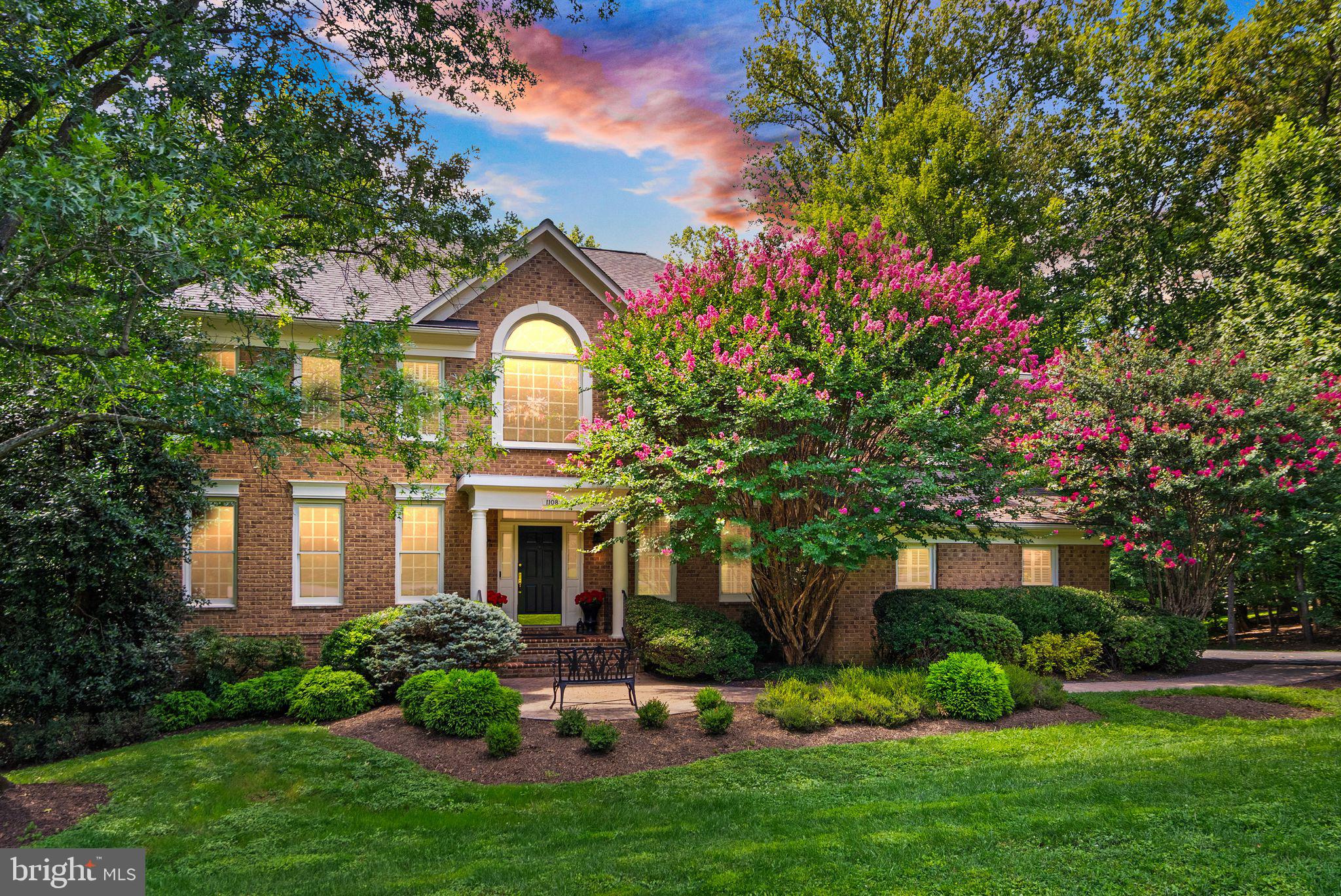 Welcome to this beautiful East Facing luxury-built estate home, by Renaissance (Grand Renoir Model), situated on almost an acre. Location is everything (where Reston/Great Falls & Herndon Meet on the Rt 7
Corridor) near major commuter routes and public transportation. This location is amazing while being
a private oasis at the end of a quiet cul-de-sac surrounded by mature trees. Upon entering the home,
you will be greeted by a grand two-story foyer & an eye-catching, curved staircase. The main level
features an open floor plan with a main level office, living room, formal/separate dining room with
Butler’s pantry. Off the dining room is the beautifully appointed, gourmet eat-in kitchen with cabinets
galore, and granite counters, center island with breakfast area. Just off the kitchen is the Great Room
with a 2-story soaring ceiling, floor-to-ceiling stone fireplace, gorgeous, oversized Palladian windows
that bring in natural sunlight with a view of the lush backyard. From the Great Room, a 2nd staircase
leads to the upstairs. The upper level features a beautiful, curved hallway leading to 4 spacious
bedrooms. The primary suite has a vaulted ceiling which breathes openness, and beautiful windows
bring in soothing natural light. The newly remodeled en-suite luxury bath has a large free-standing
soaking tub, his/her separate vanities, a glass enclosed shower, 2 walk-in closets and a beautiful
Palladian window centered over the soaking tub. The bedroom to the rear of the house has 2 large closets (the walk-in is roughed-in for a full bath - which would provide all bedrooms with their own bath. Wow, what more could you ask for? Well, there IS more!
As you open the door and head down the stairs to the Lower Level you step into your own private
cinematic escape in this professionally designed, fully soundproofed basement home theater. Outfitted
with projection equipment and custom surround sound, this space delivers an immersive movie
experience from the comfort of home. Plush recline seating, dimmable theater lighting, and acoustic
wall treatments complete the true theater ambiance. This level has a massive “bonus” room that
meets all the requirements for a legal bedroom with a full-size window looking out to the backyard. A
newly added full bathroom offering modern finishes and convenience. The Lower Level is completed
with an “almost” full kitchen featuring sleek modern cabinetry, stainless steel appliances, and a large
eat-at island and a second raised counter area behind the theatre seating for convenient snacking and
watching a movie or sports event. Whether you're hosting a movie night, birthday party or watching
the big game, this one-of-a-kind space blends comfort, function, and high-end design. Ohhh, and if
you want to check out the basement acoustics & sound proofing – step into the new bathroom and
have a conversation then step back out into the theatre space – You will be impressed!
Finally this level has tons of storage, a workshop area and a rough-in for a dog-wash station. This home has everything you need to move right in and start living! Welcome Home!!!