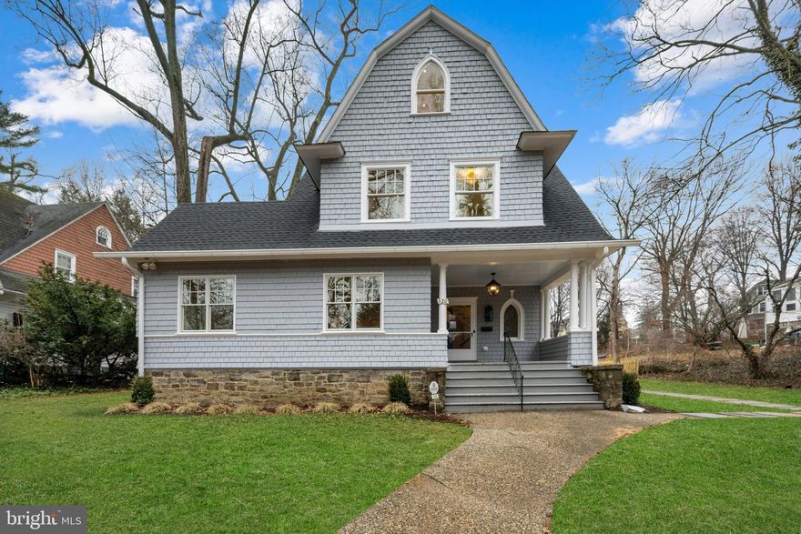 Magnificent, stately porch front Colonial in the heart of coveted Roland Park, masterfully reimagined through a complete, no expense spared renovation spanning four finished levels. Originally built in 1896, this exceptional residence seamlessly blends timeless architectural character with state-of-the-art luxury and designer finishes throughout.  The gracious main level welcomes you with an airy open floor plan highlighted by coffered ceilings, gleaming hardwood floors, and an elegant yet versatile great room featuring a custom built-in beverage nook, perfect for entertaining or everyday living. At the heart of the home is a truly show-stopping, chef-caliber kitchen appointed with restaurant-grade stainless steel appliances, expansive quartz island and breakfast bar, and bespoke cabinetry. The kitchen flows effortlessly into an extraordinary walk-in butler’s pantry complete with a built-in coffee bar, offering both beauty and exceptional functionality.  The upper levels host four generously scaled bedrooms and four brand-new designer full baths, including a luxurious primary suite designed as a private retreat. The primary suite boasts a custom 13' x 7' walk-in closet and a spa-inspired bath with refined finishes that rival the finest hotels. Every bathroom throughout the home has been thoughtfully curated with premium materials, fixtures, and timeless style.  Additional highlights include a two-car garage, sophisticated lighting, meticulous craftsmanship at every turn, and a picturesque Roland Park setting that completes this truly rare offering. This is a turnkey, magazine-worthy home—where historic charm, modern innovation, and elevated living converge.