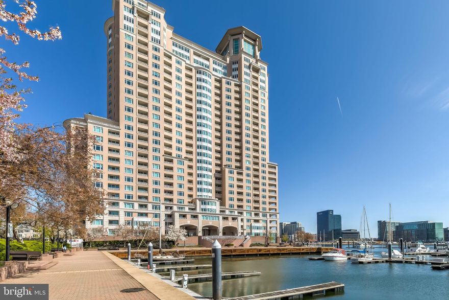 IMPRESSIVE BREATHTAKING VIEWS capture the Inner Harbor waterways and exciting city life all while in the comforts of home!!  Fresh paint thru-out and ready for immediate occupancy! Excellent open floorplan with two balconies overlooking Baltimore’s exciting Inner Harbor, Federal Hill, Pier 6 concert pavilion and the Harbor Gateway!   Bright space with open LR/DR, balcony entrance and large bay window.  Gourmet kitchen with granite counters, lots of cabinet and storage space, laundry and pass thru to main living area. Primary BR offers balcony, walk-in closet, private bath with dual vanity, stall shower plus Jacuzzi tub! Second BR perfect for office or den with double French door entry. 1,129 sf.  Foyer closet and linen closet, half bath off foyer. Gated garage parking with assigned space - other assigned spaces available for rent. Guest parking and building amenities and services for added luxury and value! 24/7 front-desk concierge, state-of-the-art fitness center, business center, newspaper delivery service, outdoor grill area, social lounge, in and outdoor pools, steam/sauna, guest suites and bike storage. The Harborview Marina & Yacht Club Community offers you the exciting and comfortable lifestyle you deserve! Beautifully landscaped grounds with many water features and park-like sitting areas, brick paved walking/jogging paths, onsite security staff, gourmet deli! Close to public transportation, I-95/695, International Airport, MARC, Inner Harbor, Business District, Stadiums, Harris Teeter, Cross Street Market, Port Covington, Stadium Square, Federal Hill, Riverside and Locust Point parks, restaurants and nightlife! A MUST SEE!