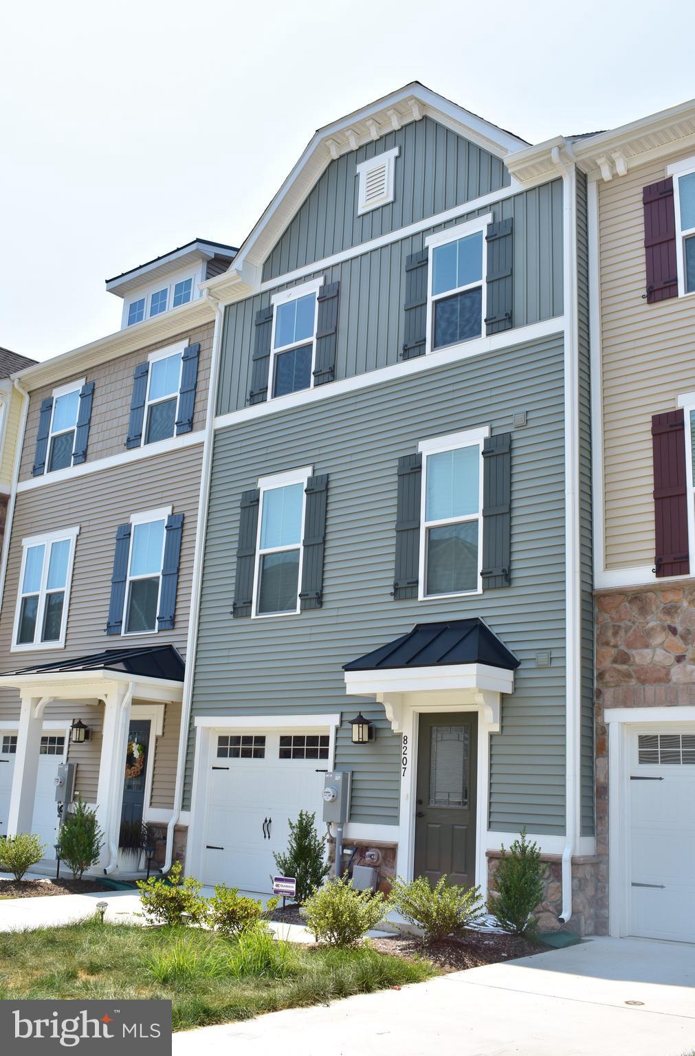 2100 sq ft of elegance. Located walking distance to waterfront. 3 level townhouse with lots of upgrades.The main floor is perfect for a family room with wall to wall carpeting and outside access.Master suite with full bathroom. The Kitchen features 42 inch modern cabinetry, granite counter tops, large kitchen island, and stainless steel appliances. Alarm system is available.1 car garage.