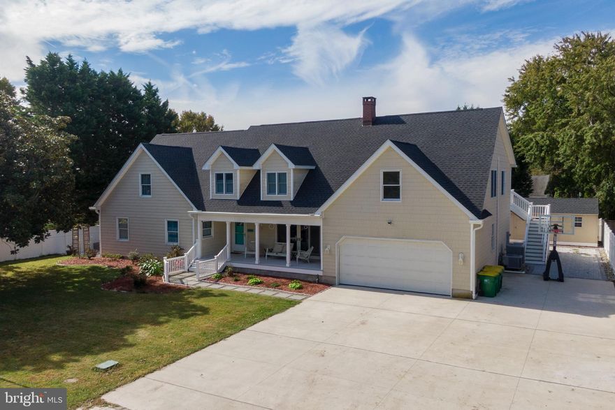 Coastal Luxury in Rehoboth/Dewey Beach just steps from the beach and downtown Dewey, this fully renovated 6-bedroom, 5-bath home blends modern luxury with coastal charm. The open floor plan highlights a gourmet kitchen with high-end appliances, custom cabinetry, and a butler’s pantry perfect for entertaining.  Retreat to the spa like primary suite with heated floors, walk in shower, and whirlpool tub. A private second floor suite with its own entrance and deck is ideal for guests or multi generational living. Two home offices add flexibility for remote work or extra living space.  Enjoy outdoor living with a Cambridge patio, hot tub, irrigated landscaping, cedar garden boxes, and a heated greenhouse. The garage is workshop ready with 240V power.  Recent updates include a new roof (2025), oversized driveway, dual water heaters, reverse osmosis system, conditioned crawlspace, and upgraded waterline. Projected rental income tops $120k annually. Sold furnished for a turnkey investment or immediate move-in.