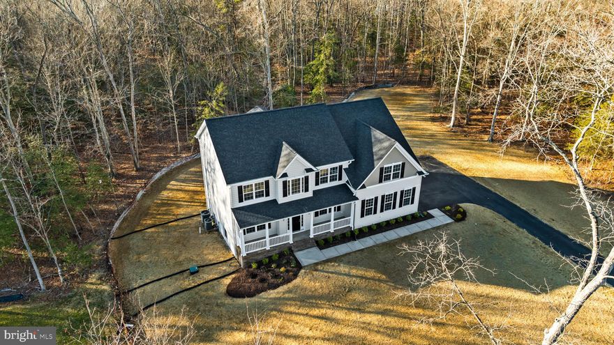 Gorgeous A1 Hampton on over 1.6 acres with tons of privacy.  Premium lot with walk out basement, finished recreation room and plenty of storage, plus 3 piece rough in for future bath.  Main level has large kitchen with an Island, Pantry, tons of storage with soft close cabinets and pull out drawers. 2 story family room with gas fireplace, plus a full bathroom on this level by the study. Formal living and dining room. Upper level features 4 bedrooms, primary bedroom with tray ceiling , large walk in closet and full bath with Deluxe shower, separate vanities and soak in tub.  Laundry room on upper level.  Call for your private showing.