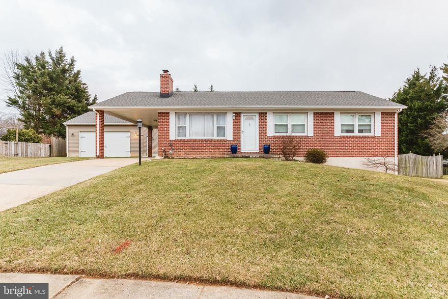 READY FOR NEW OWNERS! 4 BEDROOM, 2 BATH BRICK RANCHER--SPACIOUS LIVING ROOM WITH BRICK WOOD BURNING FIREPLACE--DINING ROOM WITH HARDWOOD FLOORING AND SLIDER LEADING TO LARGE  COMPOSITE DECK--LARGE KITCHEN WITH PLENTY OF CABINET SPACE--OPEN FINISHED LOWER LEVEL WITH FULL BATH--LARGE FENCED BACKYARD--ATTACHED CARPORT--CONCRETE DRIVEWAY--LARGE DETACHED TWO CAR GARAGE AND SO MUCH MORE!