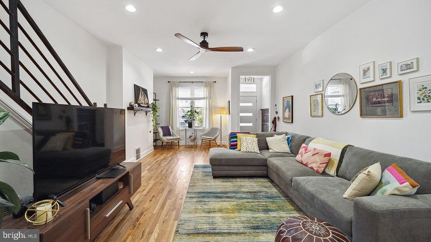 Your new home in Brewerytown awaits! A 3-story home, the property has been fully renovated and offers plentiful space for its new owner - 4 bedrooms and 3.5 bathrooms! Be immediately wowed by the entrance foyer's gorgeous wood work! The bright main level features a spacious open floor plan with hardwood flooring and recessed lighting throughout. The eat-in kitchen includes a small breakfast bar and room for a dining table, plentiful gray shaker cabinetry, stainless appliances, and tiled backsplash. At the back, a mud room/pantry area also provides access to the powder room. On the 2nd floor, you'll find the spacious owner's suite with bay window, walk-in closet, and ensuite bathroom with dual sinks and walk-in shower. Also, the second bedroom, full hall bathroom, and laundry area. Head up one more flight to find 2 additional bedrooms and a 3rd full bathroom with tub shower. The basement is also partially finished for additional usable space and includes a French drain system. Additional features include central air/heat, a covered front porch, and small fenced rear patio. If you're looking for a new home in Philadelphia, look no further and schedule some time to see this beautiful home before it's gone!