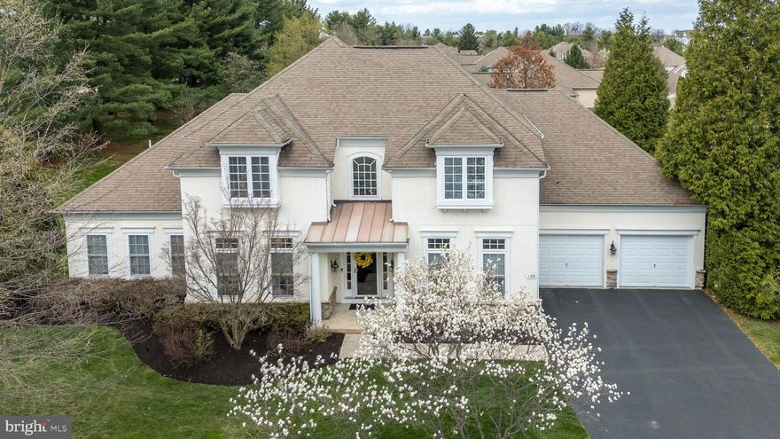 RARELY OFFERED, Stunning Richland model...a luxurious single Manor home in the award winning, gated 55+ community, "The Reserve at Gwynedd." Extensive upgrades adorn this impeccably maintained home. Enjoy FIRST floor living with an open floor plan, perfect for entertaining, offers all the space you need with all the options you will love. The main floor features hardwood floors, carpeting, tray ceilings, custom woodwork, crown molding, wainscoting, gracious foyer, and recessed lighting. The upgraded chef's kitchen boasts 42" cherry cabinets with crown molding, two- tiered granite counters, granite backsplash, newer stainless steel appliances, electric cooktop, double oven and pantry. Sliding doors from the sunny breakfast room leads to a lovely paver patio, lushly landscaped with a retaining wall and located  in a very private area. Elegant and oversized dining room, ideal for family celebrations includes a tray ceiling and millwork galore! Spacious family room with a dazzling wall of windows,  gas fireplace, custom drapes and great open floor plan. I love how the Richland Model  is extra wide with an open floor plan.  Double French doors open to a very spacious first floor office/library.  Lovely MAIN floor master bedroom suite with tray ceiling, two closets and second door accessing the patio. Spa-like bath features soaking tub, double sink vanity  and walk-in  shower. Large laundry room, powder room and 2 car garage with shelving  complete the first floor. A dramatic center double staircase leads to the second floor with two additional bedrooms, full hall bath and enormous, semi-finished storage room that is ideal for storage or can be finished as a 4th bedroom. Best of all, this home is just steps away from enjoying all activities and amenities in the 8,000 square foot clubhouse with indoor and outdoor pools, sauna, gym, aerobic room, billiards, gathering room, card and craft rooms, guest speakers all coordinated by a full time activity director. Don't miss this rare opportunity to own a single home in The Reserve at Gwynedd. Enjoy the carefree, maintenance-free luxury lifestyle this home offers!
Click the movie camera icon up top to see the video, you will love this beautiful home!