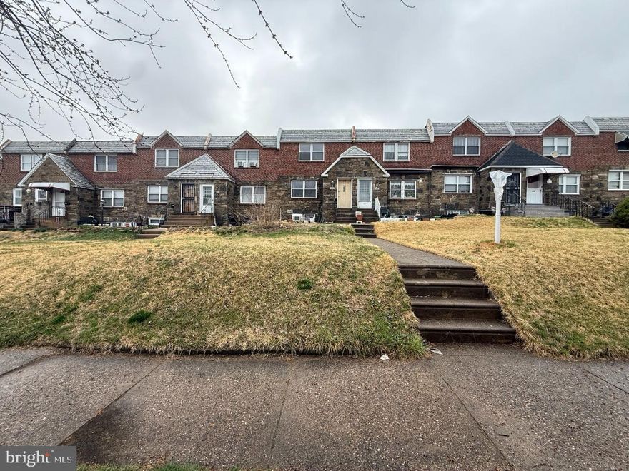 Rare find! Charming stone-front brick home with a large front yard, this spacious 18-foot wide rowhouse features 3 generously sized bedrooms and 2.5 bathrooms (one with a tub and one with a stand-up shower), along with a walk-out basement. Located in the desirable Castor Gardens neighborhood, the home offers an open-concept modern kitchen with beautiful quartz countertops and hardwood flooring throughout. Conveniently situated just one block from Gilbert Spruance Elementary School and Max Myers Recreation Center, and only steps away from public transportation, major routes, restaurants, shops, and a playground. This property is perfect for both homeowners and investors.