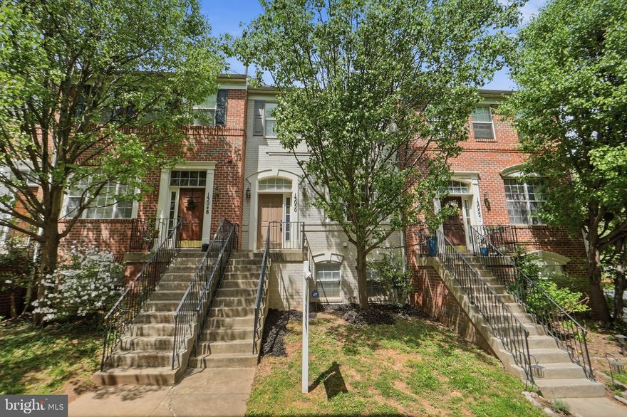 Welcome to this well-maintained brick-front townhome ideally located in the heart of Germantown. Offering 3 bedrooms, 3.5 bathrooms, a finished basement, and an attached 2-car garage, this home combines comfort, functionality, and convenience.

The main level features an open and inviting layout with spacious living and dining areas that flow seamlessly into the updated kitchen, complete with stainless steel appliances and designed for both everyday living and entertaining. Just off the kitchen, step out onto the private deck, re-stained in 2022, perfect for relaxing, outdoor dining, or enjoying your own quiet outdoor space.

Upstairs, you will find hardwood floors replaced in 2020, a convenient upper-level laundry area with washer and dryer replaced in 2022, and 3 generously sized bedrooms with 2 full bathrooms, including a private ensuite bath in the primary bedroom. The finished lower level offers additional flexible living space, featuring an expanded full bathroom and a versatile rec room that can serve as a guest area, home office, gym, or potentially a future 4th bedroom.

This home has been thoughtfully maintained and updated over the years, including HVAC replaced in 2020, water heater replaced in 2014, garage door and myQ Smart Garage opener replaced in 2022, roof replaced in 2024, kitchen sink faucet replaced in 2026, and garbage disposal replaced in 2026. The home also includes two water filtration systems: a whole-house water filtration system and a separate iSpring drinking water filtration faucet at the kitchen sink.

Nestled along quiet, tree-lined streets and walking paths, this community offers exceptional convenience to Germantown’s vibrant Town Center amenities. Enjoy easy walking access to shops, restaurants, the Germantown Library, BlackRock Center for the Arts, movie theater, and more. With quick access to I-270 and Great Seneca Highway, commuting is simple, while nearby parks and hiking trails, provide plenty of options for weekend enjoyment.