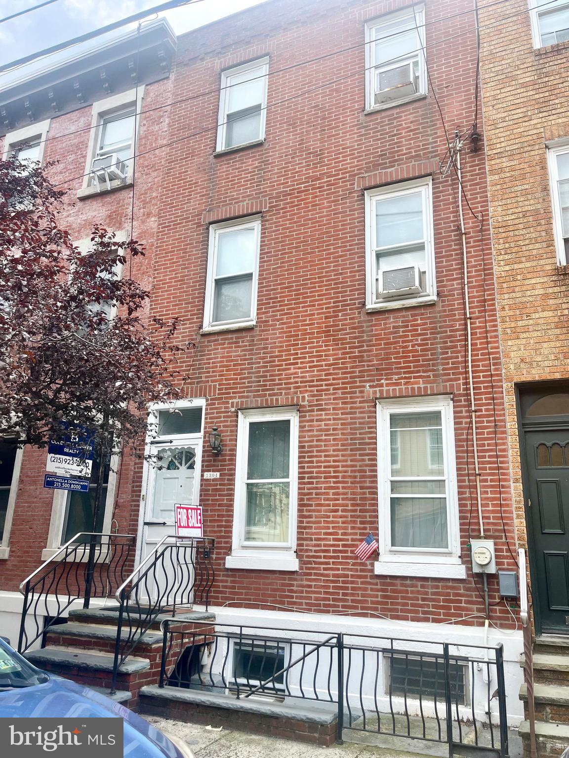 Located in the heart of the vibrant Passyunk Avenue neighborhood, this spacious 3-story home offers 4 bedrooms and generous living space across every level. A finished basement with convenient street egress adds flexibility for a guest suite, home office, or rec room. There is a private outdoor terrace off the third floor, a rare city treat perfect for morning coffee or sunset lounging.
Inside, you'll find the foundation for something truly special: original character meets potential for customization. With great bones and an unbeatable location steps from shops, restaurants, and public transit, 1204 Moore Street is a fantastic opportunity to make a home your own in one of Philly’s most beloved neighborhoods.