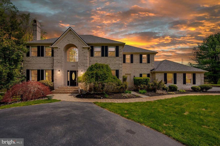 Luxury, privacy, and timeless elegance converge at this remarkable estate in the coveted Twelve Hills community of Clarksville — a prestigious neighborhood with no HOA and an unparalleled reputation for upscale living. Nestled on a breathtaking 3.4-acre lot that backs to protected forest conservation, this exceptional property offers both tranquility and convenience, creating the perfect balance between nature and refined living. As you arrive, a long, circular driveway guides you through mature landscaping to a grand entrance that commands attention and sets the stage for the home’s impressive scale. The stately façade is complemented by an oversized three-car garage. Step through the front door into a soaring two-story foyer, where natural light pours in and highlights the home’s thoughtfully curated updates and timeless charm. Spanning over 5,000 square feet, the residence features a versatile floor plan that blends open-concept spaces with modern-traditional design—ideal for both everyday living and elevated entertaining. The main level showcases fresh paint and new re-finished flooring throughout, creating a clean, cohesive aesthetic. A spacious formal living room and elegant dining area offer the perfect setting for holiday gatherings or intimate dinners, while two wood-burning fireplaces throughout the home add warmth and character. The expansive gourmet kitchen flows seamlessly into the incredible morning room, which boasts panoramic views of the surrounding woods and pool—making it the perfect place to start your day. Just off the main living areas, step onto the oversized deck, where you’re greeted with views of your private outdoor oasis. Whether you’re relaxing poolside or hosting a summer soirée, the newly retiled and re-coped in-ground pool has been completely updated with brand-new equipment and is accompanied by a brand-new pavilion. Upstairs, the home features four generously sized bedrooms, including an impressive primary suite with a luxurious ensuite bath. The primary bathroom offers both size and function, with dual vanities, a soaking tub, and walk-in shower—truly a retreat within your home. Each bedroom provides ample space, storage, and serene views of the surrounding greenery. The finished lower level is designed for comfort and flexibility, offering additional entertaining space, recreation zones, or the opportunity to create a home theater, fitness area, or guest quarters with the fifth bedroom, tailored to your lifestyle. With a new roof, 2021 water heater, and new washer and dryer, the major systems of the home have been thoughtfully updated. Beyond the home itself, the setting is truly what makes this property a rare offering. Backing to acres of untouched forest conservation, you'll enjoy unmatched privacy and serenity, all while being just minutes from the area's best schools, shopping, commuter routes, and more. Whether you're seeking a private estate, a home designed for entertaining, or a peaceful sanctuary with modern conveniences—this residence in Twelve Hills delivers it all. No HOA. Just timeless luxury, natural beauty, and an incredible opportunity to live in one of Howard County’s most desirable communities. *Sellers prefer Friends Title and Escrow*