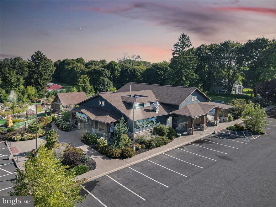 Community cornerstone business featuring a new restaurant, 19 hole miniature golf course and an ice skating facility. Commercial grade lighting for night time golfing. 54 person indoor seating coupled with an outdoor pavilion to accommodate another 75 customers. New HVAC with regularly scheduled maintenance featuring a propane backup generator. Newly paved parking lot with ability to accommodate 50+ vehicles. ADA compliant. Nothing was spared in the development of this top-notch property!