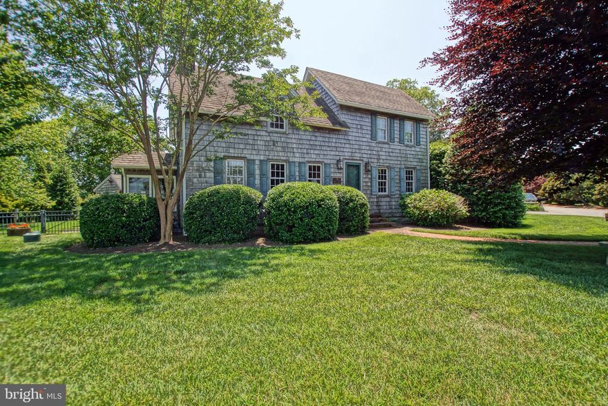 After a complete renovation this extraordinary home received the Lewes Historical Society Award of Excellence for 2010. Situated on an oversized professionally designed & landscaped corner lot, this home overlooks the Lewes/Rehoboth Canal. Restorations were meticulously done to preserve the beamed ceilings, wide planked floors and  3 working fireplaces. New kitchen and bath rooms and the spacious primary suite on the first floor were done in 2007. Included and across Gills Neck Road is a fenced, 100 ft  waterfront parcel - prime real estate with fire pit and patio just waiting for you to install your dock. Don't miss this one!