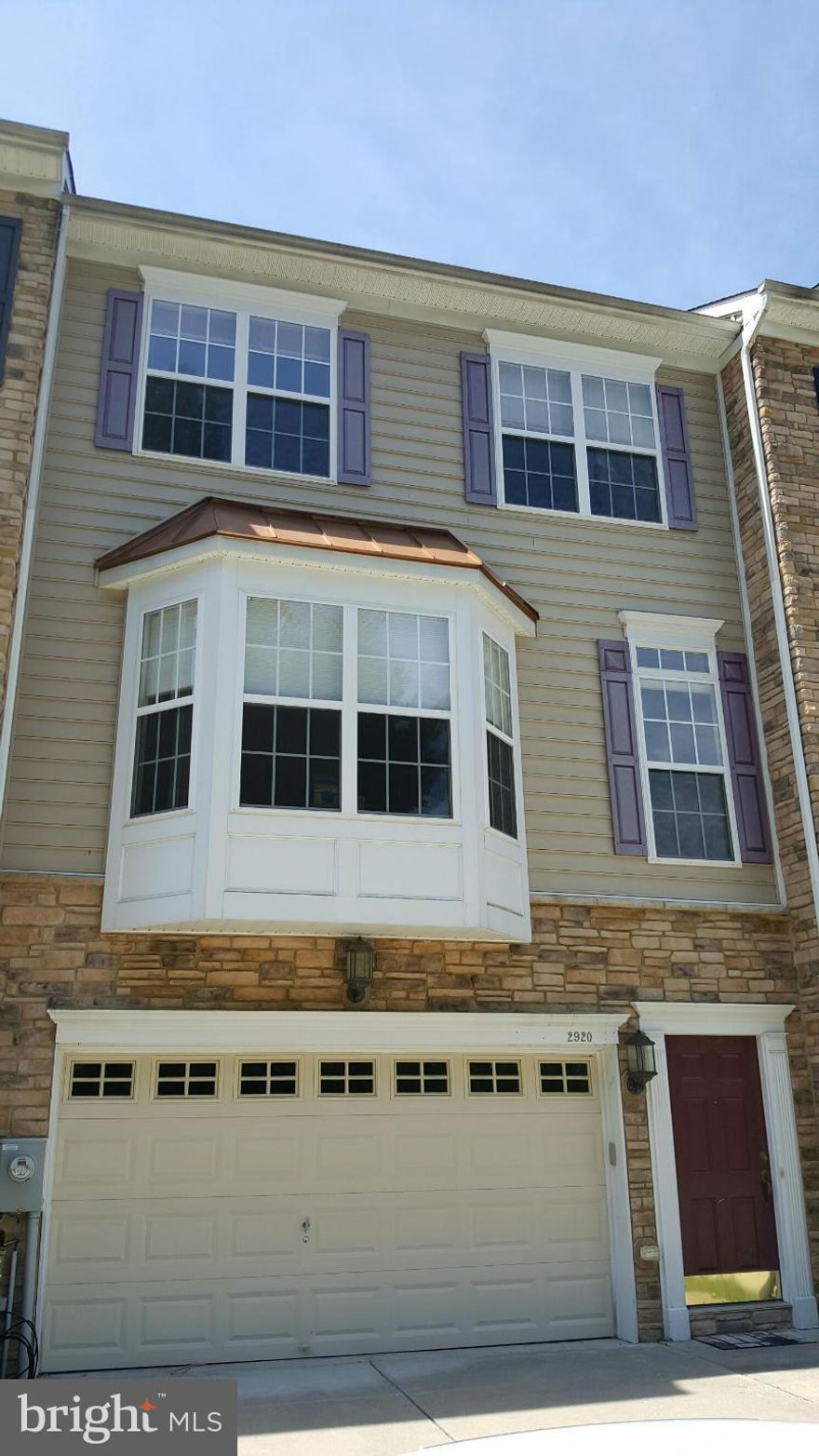 Stunning, 3 level luxury townhouse located in the heart of Ellicott City*Stone front w/2 car GAR*High 9' ceilings*Wood floors throughout main level*Spacious KIT w/SS appliances, corian counters, 42" cabinets, double oven & breakfast bar*Maintenance free deck*Large Master Suite with 2 walk-in closets, tray ceiling, soak tub/sep shower*Easy access to Rte 29, I-695 and I-70*Condo fee included in rent