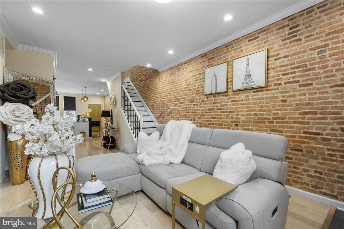 **Timeless Charm Meets Modern Elegance**
Welcome to **2215 E Chase St**, a beautifully updated home in the heart of Baltimore, offering the perfect blend of historic charm and contemporary living. This stunning residence boasts 3 bedrooms and 3 bathrooms, thoughtfully designed for comfort and style.
Step inside to discover an open-concept living space bathed in natural light, featuring luxury vinyl planks, stylish recessed lighting, and a seamless flow into the dining area. The gourmet kitchen is a chef’s dream, complete with granite countertops, custom cabinetry, and state-of-the-art stainless steel appliances.
Upstairs, the spacious bedrooms provide a serene retreat, while the luxurious bathrooms showcase designer finishes and spa-like touches. The finished lower level offers versatility—perfect for a home office, entertainment space, or guest suite.
Outside, enjoy a private patio, ideal for summer gatherings. Conveniently located near Johns Hopkins, Patterson Park, and other local landmarks, this home is just minutes from vibrant dining, shopping, and entertainment.
Don’t miss the chance to own this exceptional Baltimore gem. Schedule your showing today!