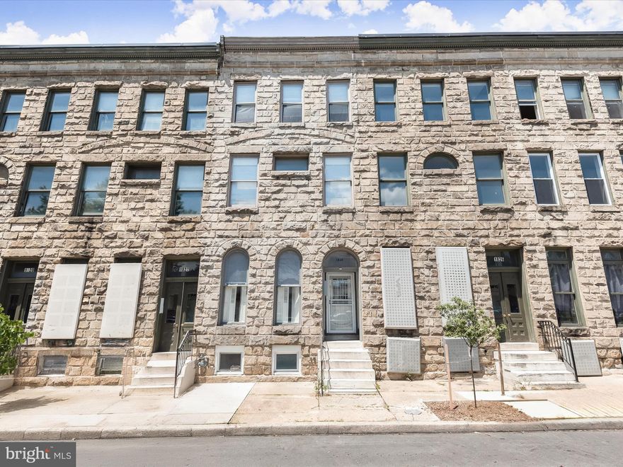 Triplex in Baltimore City that has been updated within the last few years. Four levels with two one-bedroom/one-bathroom units, and one two-bedroom/one-bathroom unit. Each of the three units have separate utility meters for their electricity, central air conditioning, and water heaters. Modern amenities and upgrades, exposed brick walls, tall ceilings and an abundance of natural light throughout make this an attractive building for tenants. Apartment #1 on the entry/first level is a one-bedroom/one-bathroom unit. Apartment #2 on the second level is another one-bedroom/one-bathroom unit. Apartment #3 on the top level is a two-bedroom/one-bathroom unit. The finished basement includes inside access with a bonus room that could be used for additional storage or could be converted back into a fourth unit for additional rental potential, with a full bathroom featuring a tub-shower. The common laundry room on this level has two sets of coin-operated washers and dryers, and a door outside to the rear with a one-car parking pad, accessible from the alley. Centrally located in the Charles North neighborhood of the Station North Arts and Entertainment District of Baltimore. Convenient for commuters, just a few blocks north of Penn Station with Amtrak and MARC trains, along with several Light Rail and bus stops nearby, and quick access to 83. Just several blocks away are The Maryland Institute College of Art (MICA) and The University of Baltimore, while Johns Hopkins University is just over a mile away. Apartment #1 is currently rented with a yearly lease up for renewal in October 2025. Apartments #2 and #3 are both currently rented with yearly leases up for renewal in February 2025. Owner pays for gas and electricity for the common areas and basement, while the tenants are responsible for their own apartments. The water bill is also split into thirds. Some images have been virtually staged. Short Sale - Being professionally negotiated.