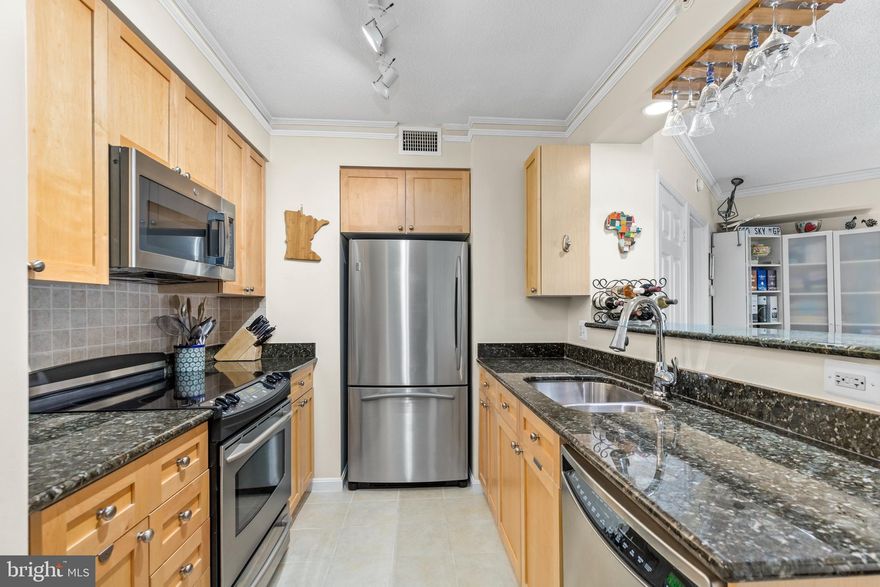 “Cambridge” Model: 2BR+Den. This floor plan has it all : Huge Balcony w/ DC view + gas FP+ Storage bin (#G3-165) and the unit comes w/ TWO garage parking spaces: # 270 & # 273. Maple Kitchen Cabinets w/ stone backsplash,  'GE' SS  Kitchen appliances, crown molding/chair railing throughout. The condo has lovely wood flooring and was professionally painted in 2021. This luxury condominium w/ 24/7 concierge is perfectly located in the heart of Alexandria w/ direct access to I-395 and 4 miles away from Amazon s National Landing HQ2, a prime living location! NHP has a fabulous exercise room with sauna & locker room, relaxing community pool, lawns, picnic area w/ fire pits, business center, community room, management. *Super locale bordering Arlington & Falls Church*Close to many restaurants, shopping, etc. Enjoy Express & Daily Metro bus & DASH bus service to King Street Metro and easy access to major transportation routes for convenient commuting! The Gateway Alexandria anchored by a Harris Teeter is conveniently located just a few steps away. A pet friendly community. Condominium accepts 1 dog any weight, or two pets max weight 35 lbs. each at maturity. Be the 1st to apply!
