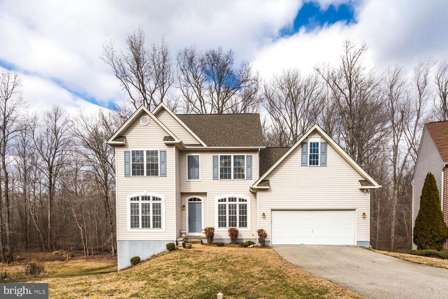 This lovely 2 car garage colonial is situated at the end of a cul-de-sac in the sought after neighborhood of Cartagena Highlands. A wonderful location for commuters to DC and Virginia!  New carpeting in the basement level and new flooring in the kitchen!  Main level has a separate living room and dining room with hardwood flooring, cozy family room with gas fireplace off the eat-in kitchen , one bedroom/office and half bathroom.  Upper level features 3 bedrooms, 2 bathrooms and laundry room. Finished walkout basement provides extra living area and has another full bathroom. Detached storage shed in the rear yard. This home shows well and could be yours! PLEASE PRACTICE COVID-19 PROTOCOL .Owner ask all viewing the home to wear a mask and to please remove their shoes upon entering the home.  All lights will be on in the home to avoid touching.  Thank you in advance for your cooperation.
