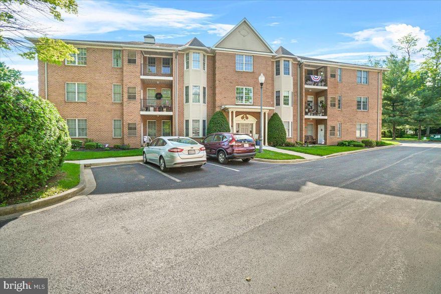 Very well maintained first floor garden condo in downtown Woodsboro.  With a den/office off of the kitchen, this is one of the larger units in the building. Two bedroom and two full baths with private patio.  Some noteworthy features include a central vacuum system, water filter and water softener, brand new washer and dryer, 2 year old water heater, and 5 year old HVAC.  The building does have an elevator and the unit comes with a single car garage.  The parking lot provides ample additional parking as well for the building.