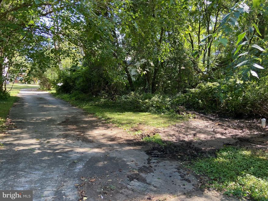 Grading permit/Building has been approved.  Build a mansion or a single family home. Lot is behind 109 Norman Ave, Glen Burnie, MD 21060.  Lot has its own shared driveway.