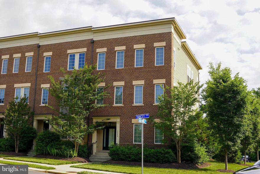 MOVE-IN READY MILLER & SMITH END UNIT TH – JUST STEPS FROM THE BRAMBLETON TOWN CENTER, backing to a park-like setting for enhanced privacy and enjoyment! Plenty of room to live, work and play in this very well-maintained Pierpont model that is loaded with upgrades. Upon entry you will encounter beautiful French doors that open to a generously sized home office that could also be used as a bedroom. This level also features a full bath and a generous living area that would be fantastic as an additional family room, additional home office or gym.  Head upstairs to the open concept kitchen, family room and dining area – absolutely perfect for entertaining. The kitchen is truly stunning with upgraded cabinetry and a massive granite island. The double-sided fireplace shared by the family room and outdoor patio, the wide plank floors and abundant windows are just some of the special touches that give this home a casual elegant feel. The third level includes the master suite with an upgraded ensuite bath, walk-in closet, two additional bedrooms with walk-in closets, a second full bath and a generously sized laundry room with utility sink. The oversized, two car garage ensures plenty of room for your cars with additional storage space should you need it. Don’t spend the weekend worrying about yardwork, lawn maintenance is included in the Brambleton HOA fee as well as your Verizon FIOS internet and cable! Simply cross the street to enjoy everything the Brambleton Town Center has to offer-shopping, dining, farmers market, One Life Fitness, Library, Harris Teeter. See attached information sheet denoting the many pools, parks and community center locations. Feeling adventurous, the Beaverdam Reservoir is also less than a mile away and is a perfect place to kayak, paddleboard or just take in a beautiful setting.