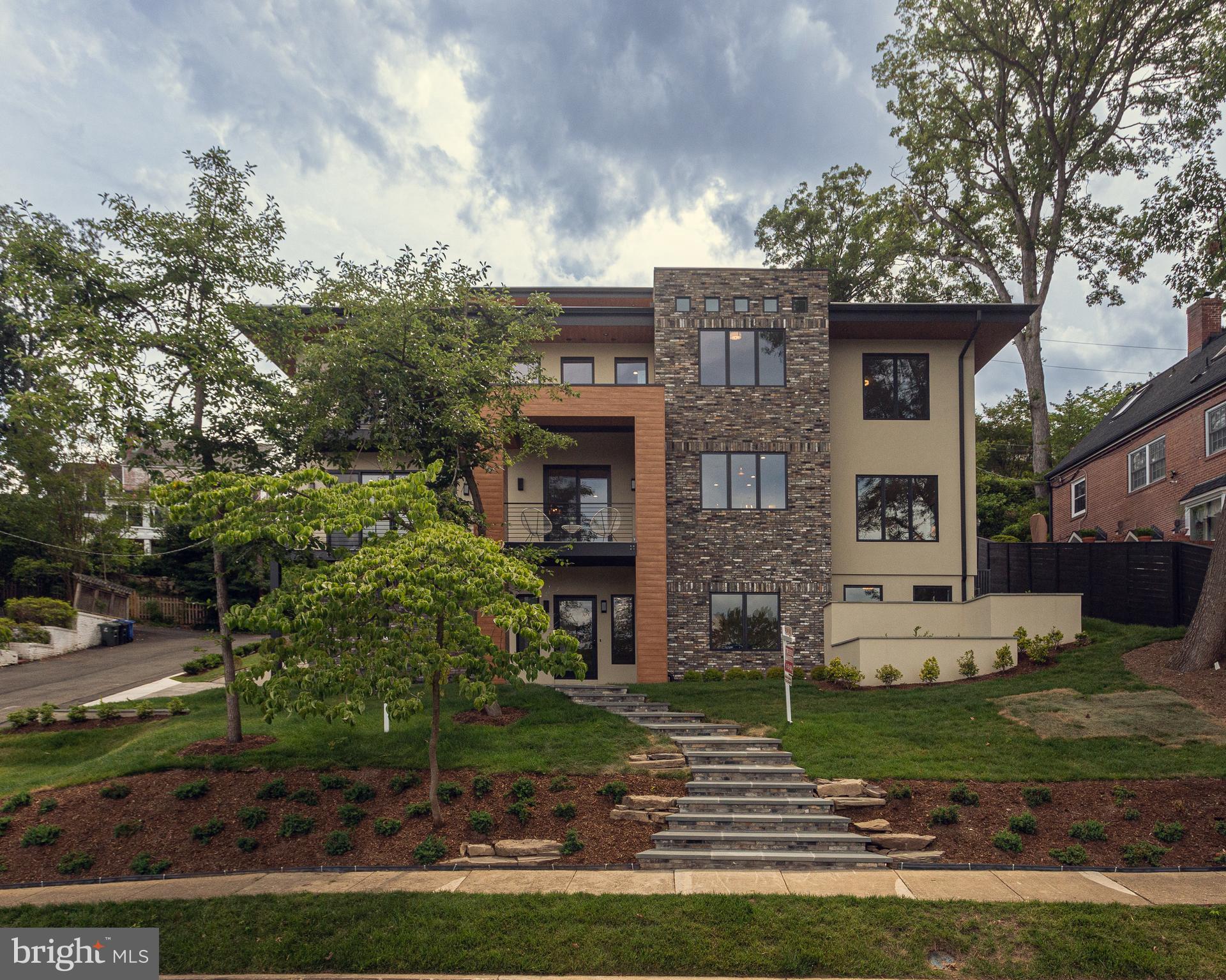 Introducing a Luxurious Masterpiece in Arlington - Pentagon City - National Landing! Welcome to a home that embodies opulence and offers unparallel views of the iconic Washington Monument and The Capitol. This exquisite 4-story residence boasts over 6000 square feet of pure luxury, complete with an Entry Level featuring a 2-car garage and an elevator that connects all 4 levels!
*Step inside and discover a world of refined elegance. The Entry Level greets you with a Formal Office, a versatile Great Room and guest quarters featuring a spacious bedroom and lavish bathroom. The convenience of a Mudroom with a Powder Room ensures effortless organization.
*Prepare to be captivated as you ascend to the Main Level, designed to be an entertainer's dream. A grand entrance leads to a Formal Dining Room where you can host memorable gatherings. The luxurious Gourmet Kitchen adorned with top-of-the-line Jenn Aire appliances, an oversized kitchen island and contemporary cabinetry provides the perfect space for culinary delights. A Pantry Room and a Butler's Pantry add an extra touch of convenience. The Breakfast Room and Great Room beckon you to relax and enjoy moments with loved ones. Open the oversized sliding doors to the front veranda flooding the entire floor with natural light and creating an inviting ambiance.
*As you make your way to the Bedroom Level a haven of tranquility awaits. The expansive Owner's Bedroom Suite will leave you in awe, boasting a magnificent Master Bathroom featuring dual shower heads, body sprays and a self-standing soaking tub for ultimate relaxation. Three additional bedrooms, including a suite with 12-foot ceilings and two bedrooms connected by a Jack and Jill Bathroom, provide ample space for family. To enhance your convenience, a full Laundry Room is located on the same level.
*Prepare to be amazed as you reach the crown jewel of this meticulously crafted home - the Fourth Floor Rooftop Lounge. Here, entertainment reaches new heights! A rooftop bar with a support wet bar, dishwasher and refrigerator awaits, allowing you to effortlessly host unforgettable gatherings. Step onto the enormous Rooftop Patio and be mesmerized by the breathtaking views of Washington DC. This is the epitome of luxury living!
*Don't miss this rare opportunity to own a high-end, luxurious home in Arlington! Sophistication and incomparable views merge seamlessly at this unique home. Contact us now to make this extraordinary residence your new home and experience a lifestyle that is truly one of a kind!