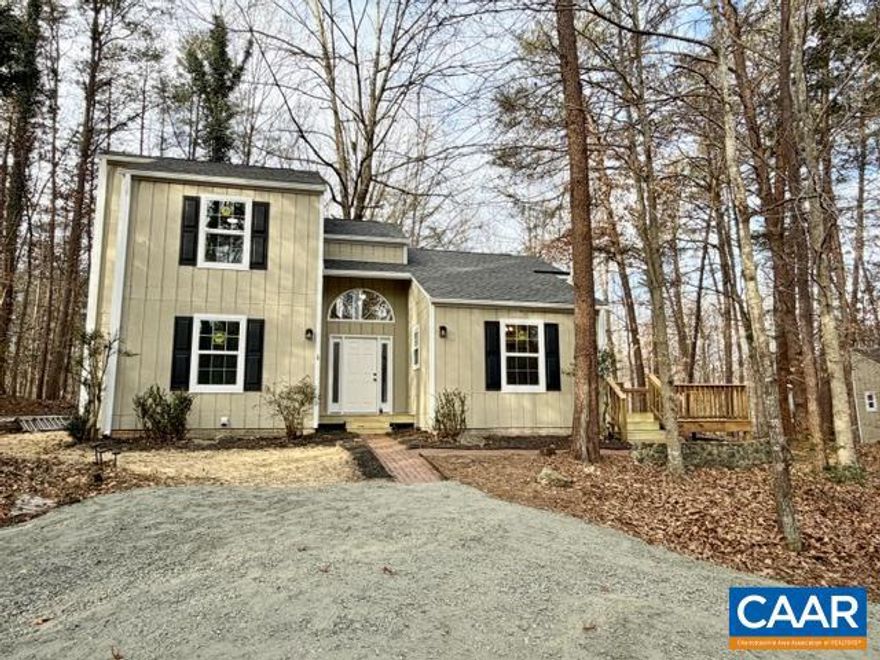 Tucked away on 2.74 wooded acres in a quiet, agricultural-zoned neighborhood, this extensively updated contemporary home offers refined privacy with everyday convenience?bring the chickens and enjoy the space. From the new roof, windows, and siding to the flooring, kitchen appliances, fixtures and even the door hinges and floor grates, every detail has been thoughtfully refreshed, giving the home a truly brand-new feel. Light filled living room and vaulted ceilings enhance the home?s airy, modern feel. A welcoming open foyer flows seamlessly into the living and dining areas, creating an ideal space for both entertaining and everyday living. The kitchen features gleaming stainless steel appliances and opens to a new deck perfect for al fresco dining or grilling. The main level offers exceptional flexibility with a bedroom, office, full bath, and laundry. Upstairs, a striking catwalk overlooks the foyer and living room and leads to two additional bedrooms, including a serene primary en-suite. Two sheds provide ample storage for garden and outdoor equipment. Nestled at the end of the street, this home feels like a private escape?yet remains just minutes from local amenities.,Granite Counter,Painted Cabinets