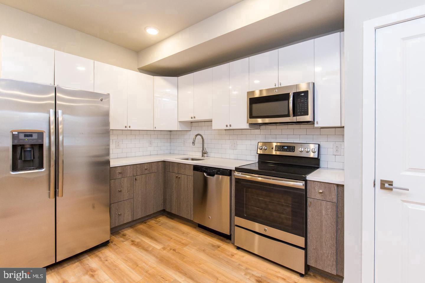 Available NOW: You'll love this gorgeous, sunny unit as soon as you enter! Start the tour at your private entrance, and head up the entryway stairs to the open concept living/dining space. Hardwood floors, exposed spiral ductwork, recessed lighting, and a sleek kitchen with stainless steel appliances and white quartz countertops complete this space. Continue back through this straight-through floorplan, and you'll find the full bathroom with modern fixtures and finishes, laundry closet with stacked washer/dryer, and finally, the spacious bedroom. There's high ceilings, a large closet, and sliding glass doors to your private deck out back! Schedule your showing today! Note: photos are examples from the adjacent building. Exact layout and finishes may differ. About The Neighborhood: Walking distance to Temple University Hospital and the Huntingdon Station for the El, this lovely space is one of the new construction apartments in this contemporary style building in Kensington. Lease Terms: Generally, first month, last month, and one month security deposit due at, or prior to, lease signing. Other terms may be required by Landlord. Rental application via Rentspree link. Pets are conditional on owner's approval and may require an additional fee, if accepted. ($500/dog and $250/cat, or monthly pet rent). Tenants responsible for all utilities: $65/month flat water fee, electricity, cable/internet.
Rental Requirements:
1) first and double security to move in.
2) $45 non refundable application fee per applicant for credit and background check.
3) must be able to provide proof of net income of at least three times the monthly rent.
4) minimum 600 credit score.
5) All persons over the age of 18 must complete a rental application.