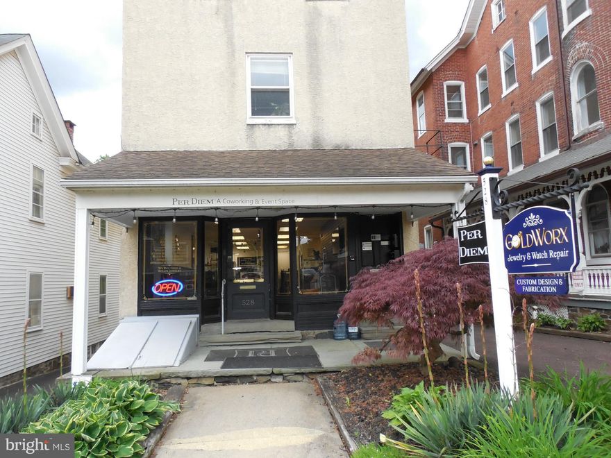 TRIPLE  CROWN   WINNER:             WIN with one of the best business core locations in Perkasie Borough; Its Near Everything!          WIN with an updated maintenance-free building with off-street parking and possible expansion opportunities.       WIN with a mix of rental income:  Retail, Residential and Professional: It has it all!

The first floor is retail oriented with a large display room, a private office and 2 powder rooms.  The second floor is currently being used as professional space and consists of 2 private offices, a reception area, a nicely equipped kitchen and a full bathroom.  This unit was designed and previously used as a 2-bedroom apartment and could quickly and easily be converted back to residential.  The third floor is a 2-bedroom 1 bath with a modern kitchen and large living and full bath.
Each floor is separately metered  and the tenants pay all utilities including a pro-rated share of the cold water and sewer