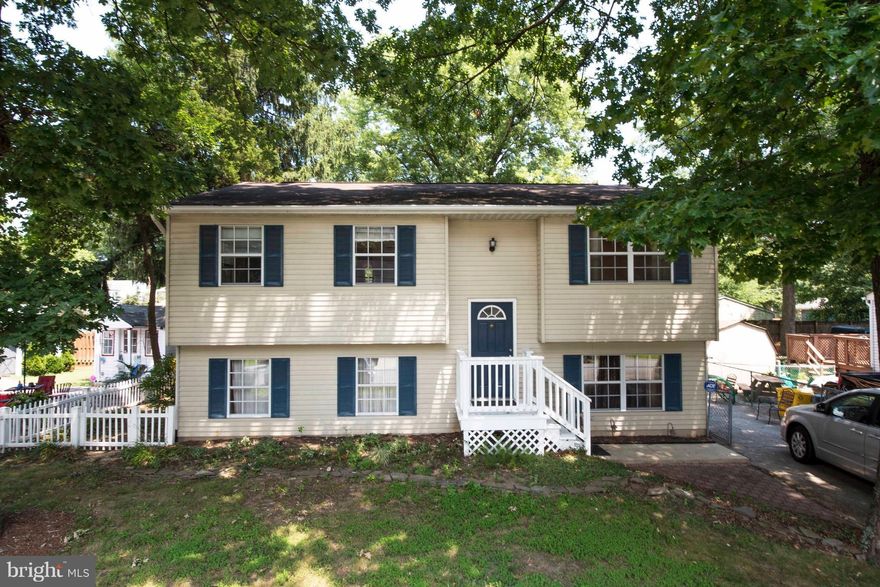 SPACIOUS HOME IN WATER PRIVILEGED COMMUNITY--4 BEDROOMS, 2.5 BATHS--MANY UPGRADES INCLUDING FRESH PAINT, CARPET AND STAINLESS STEEL KITCHEN APPLIANCES IN 2017--NEWER HOT WATER HEATER--LARGE FAMILY ROOM WITH COZY WOOD STOVE AND SLIDERS TO PATIO.  FENCED REAR YARD--COMMUNITY OFFERS MULTIPLE BEACHES, MARINAS, PLAYGROUNDS, BOAT RAMPS.  MOVE-IN READY!