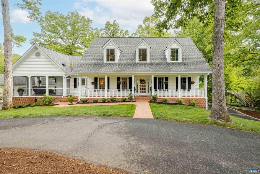 Welcome to this beautifully updated 4BR/4.5BA home in the gated Glenmore community! Wonderful outdoor porches and a spacious rear deck create the perfect spaces to relax and entertain, while a thoughtful floor plan creates comfortable living spaces inside.  Since purchasing, owners have completely transformed this home, creating a truly move-in ready property.  The fully updated kitchen features quartz countertops, a spacious island, designer lighting, and two pantries for exceptional storage. The spa-like main-level primary suite has been recently renovated and offers a luxurious retreat.  Upstairs, you'll find an additional en-suite bedroom, plus 2 more bedrooms and a full bath. The terrace level includes a large rec room with walk-out access to the private rear yard, a full bath, exercise room, workshop, two garages, and golf cart storage. Other updates include a new roof, new deck and rear patio, extensive lawn and tree work including installation of lawn irrigation, new brick leadwalk, removal of quest pipes, new Pella sliding doors & so much more.  Just a short stroll to all that Glenmore has to offer, including golf, tennis, pickleball, pools and dining. Purchaser qualifies for 25% off initiation to The Club at Glenmore.,Painted Cabinets,Quartz Counter,Fireplace in Family Room