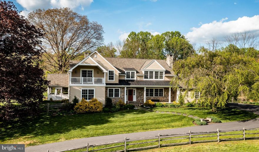 Heron Hill Farm is set on 10.2 acres featuring an absolutely stellar four bedroom, three bathroom home in the sought-after Unionville-Chadds Ford School District with Garage, Barn, Guest suite, Paddocks and Pond. Located on a Pennsylvania designated “Scenic Road”, this charming property has been lovingly and significantly updated with major improvements, renovations, expansions conducted by the current owner. The main level features a well thought out floor plan. The Foyer opens to the adjoining Living Room, featuring a fireplace with an antique mantel. On the other side of the Foyer is a wonderful Library/Office with a wall of built-in shelving and desk area, all custom crafted by T. L. King Cabinetry. You will love the spacious gourmet Kitchen featuring volumes of custom cabinetry by Adelphi Cabinetry, high end stainless appliances, and significant amounts of gorgeous quartz countertops. Connecting the Kitchen with the Family Room is the Dining area, with stunning views of the flagstone terrace and the gardens beyond. The spacious Family Room features a second fireplace which also has an antique mantel. Off the Family Room is a wonderful screen porch with vaulted ceiling, fan, and flagstone floor. A hallway from the Foyer leads to a guest bedroom with southerly views and a private, tasteful full bathroom. If desired, this could easily serve as a first floor Primary Bedroom. Off the east end of the Kitchen is the Mud Room/Laundry Room with a large stainless sink, four cubbies, and handsome slate floor. From here is direct access to the large two car Garage Upstairs is an airy hallway with room for a cozy reading nook, access to two secondary Bedrooms, a Hall Bathroom, and the stunning Primary Bedroom Suite. The Primary Bedroom Suite features a large bedroom with built-ins, access to a covered porch with fabulous views over the front pasture and pond, a huge walk-in closet, and a fabulous Primary Bathroom. The basement is exceedingly clean and features a new water heater, whole house dehumidifier, and a new geothermal heat pump. This home is in absolute move-in condition! For the equestrians, there is a wonderful six stall Barn with a tack room, wash stall, and plenty of ground level storage for hay and bedding. Upstairs is an amazing Apartment with a large Living Room, Kitchen/Dining area, Bathroom, and a Bedroom with its own private deck. If your not a horseman but a car collector, this barn could easily be transformed into a fabulous garage with plenty of space to house a large car collection. The property has lovely pastoral views as well as a fabulous large Pond with its own island! Surrounded by similar properties, Heron Hill Farm is just a short walk or hack from the Cheslen Preserve. The great location is convenient to West Chester, Wilmington, and only 45 minutes from the Philadelphia Airport.