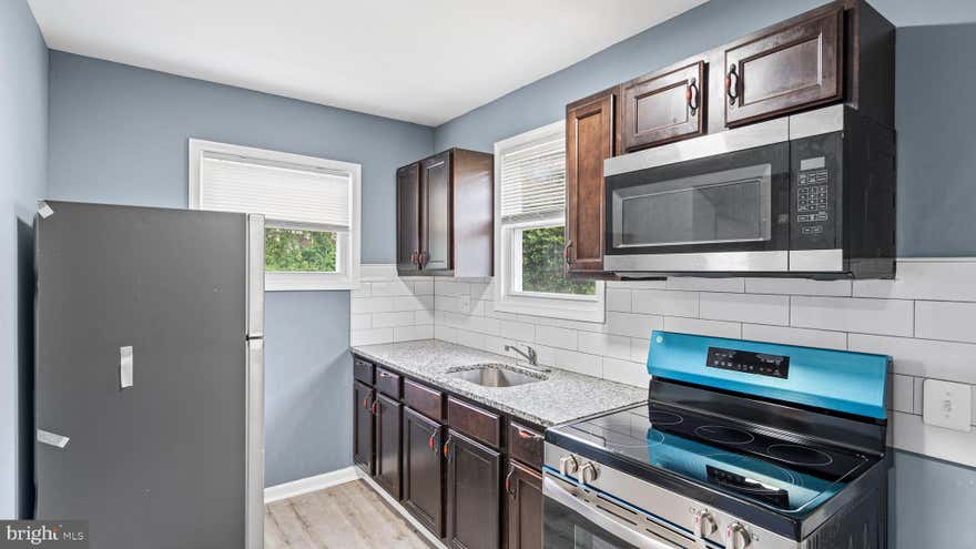Welcome to 2916 Presbury Street — a spacious and beautifully updated corner home offering the perfect mix of charm, functionality, and modern convenience. From the oversized bedrooms and generous storage space to the private backyard and detached garage, this home delivers room to live, entertain, and grow. the hme was fully renovated including a newly installed washer and dryer and fully operational AC system . The detached garage offers endless flexibility for parking, storage, a workshop, motorcycles, or ATVs — a rare city find! Conveniently located near downtown Baltimore, commuter routes, shopping, and dining, this home is an incredible opportunity for both homeowners and investors alike.