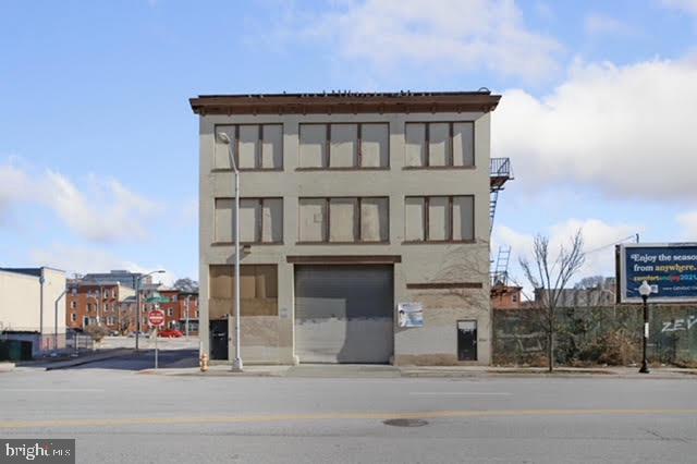 Back on the market! Serious Inquiries Only. 3-story building with basement, fenced parking lot, in addition to street parking. 1 bay door. Elevator Shift, Renovation needed. Zoned B-2-2 for commercial and/or residential. Mins from Harbor East, Johns Hopkins, downtown, highways. Development in the area. "As is".
Approx: 13,000 sq ft. Possible Uses: Mixed-use, apartments, offices, warehouse, fitness center, grocery store, restaurant, and much more. Front and Side Entrances. Attached parking lot included - currently being rented on a month to month. Great location for redevelopment.
Call for more information.